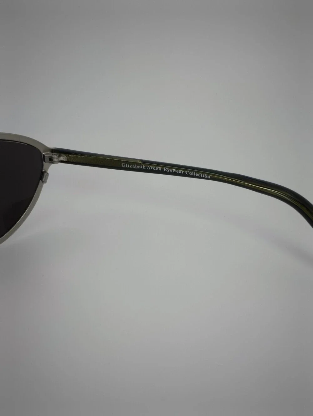 Elizabeth Arden Oval Wrap Sunglasses with Dark Lenses and Silver Frame
